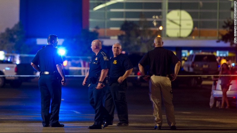 Police respond to movie theater shooting. Photo Courtesy of CNN.