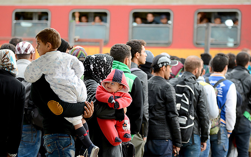 Refugees at rail station in the Macedonian border town of Gevgelija. Image Courtesy of telegraph.co.uk.